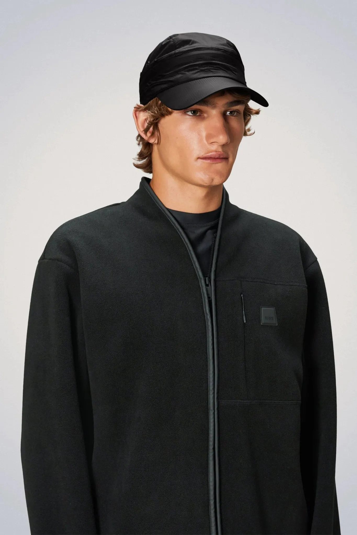 Optimized Weather-Resistant Zip Cap from RAINS NORTON - English Version